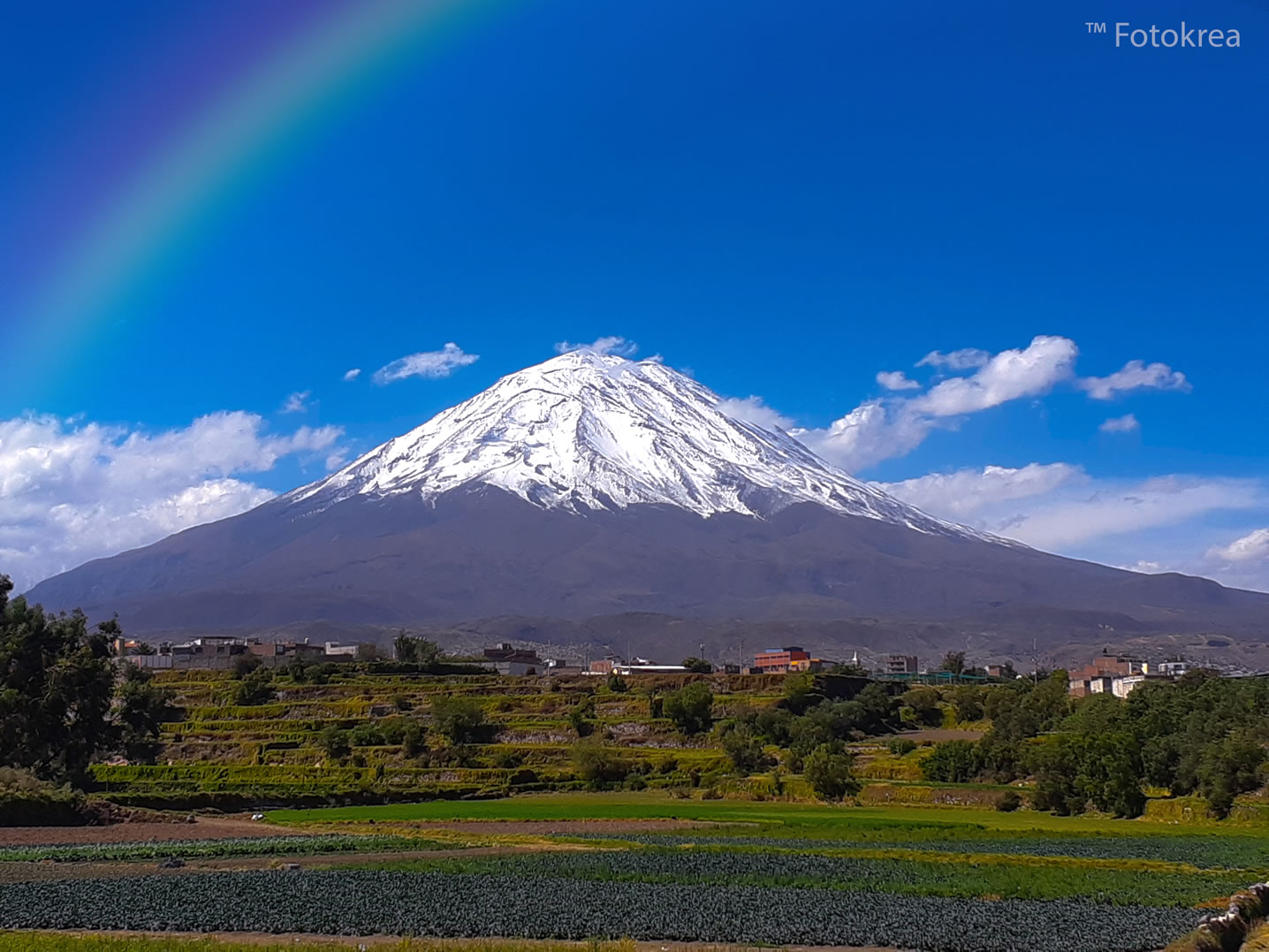 Arequipa cityscape with snow-capped volcanoes